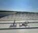 Línea de vida horizontal de cable instalada sobre techo con paneles solares - Divertical