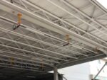 Línea de vida overhead XTR instalada bajo estructura metálica de cubierta